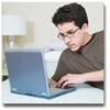 young man looking at laptop